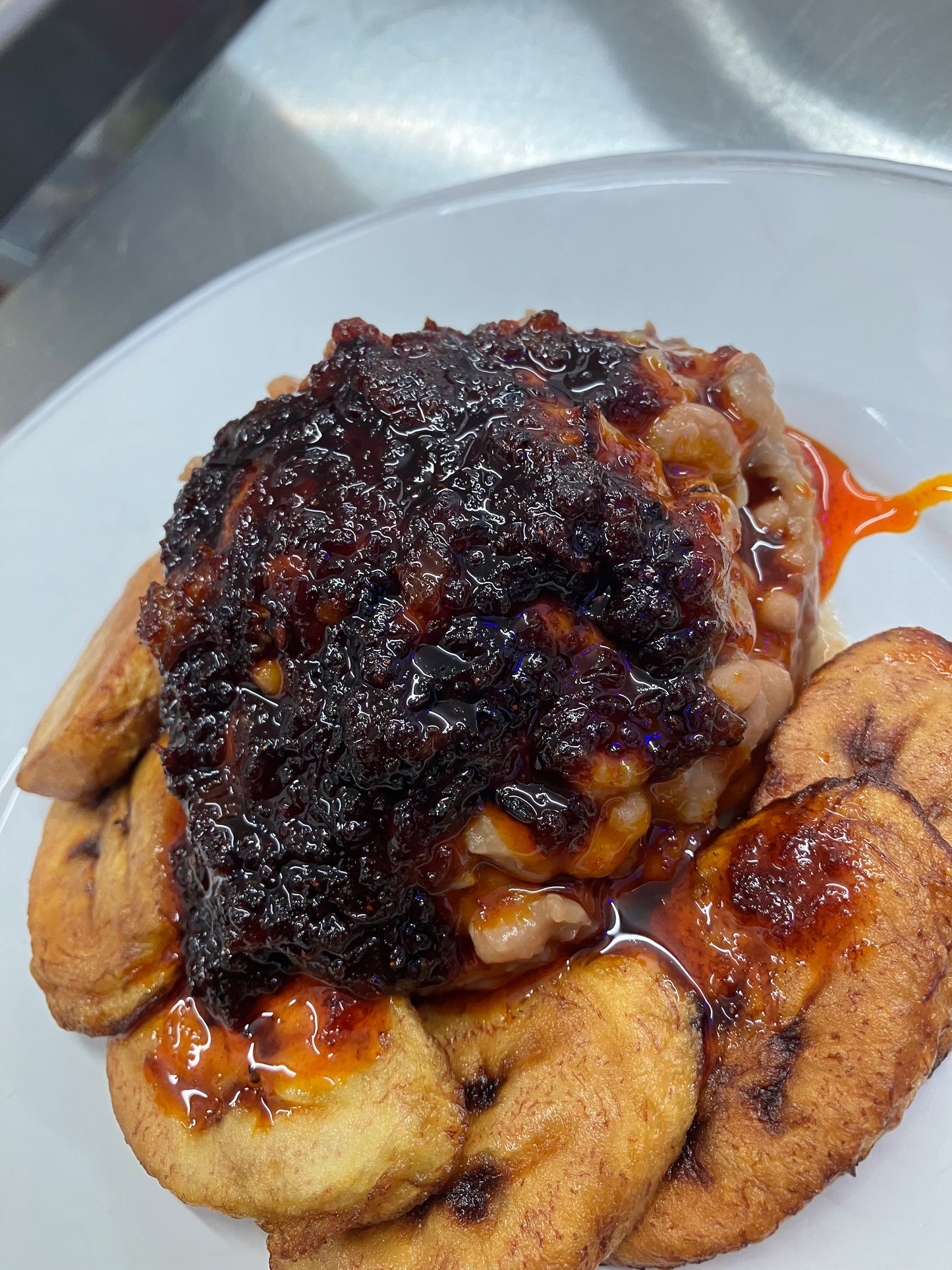 Beans and stew (Ewa Agoyin)