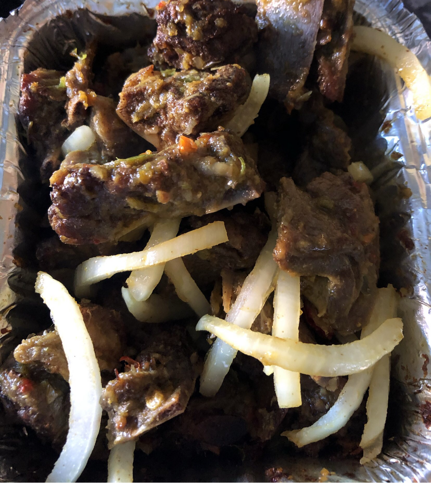 Asun - grilled peppered goat meat